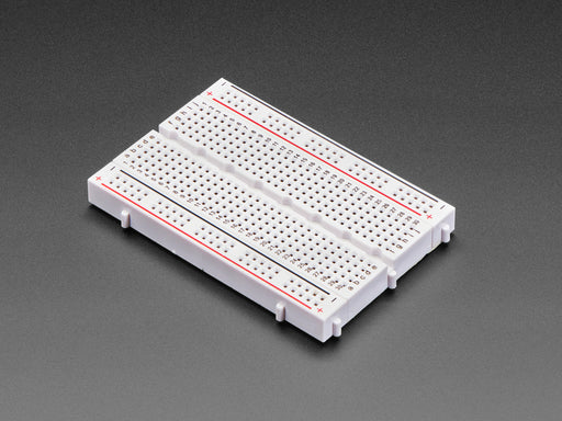 Angled shot of Half-Size Breadboard with Mounting Holes.