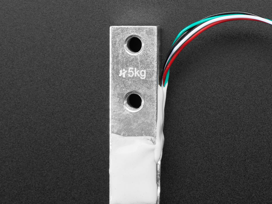 Angled shot of a Strain Gauge Load Cell - 4 Wires - 5Kg. 