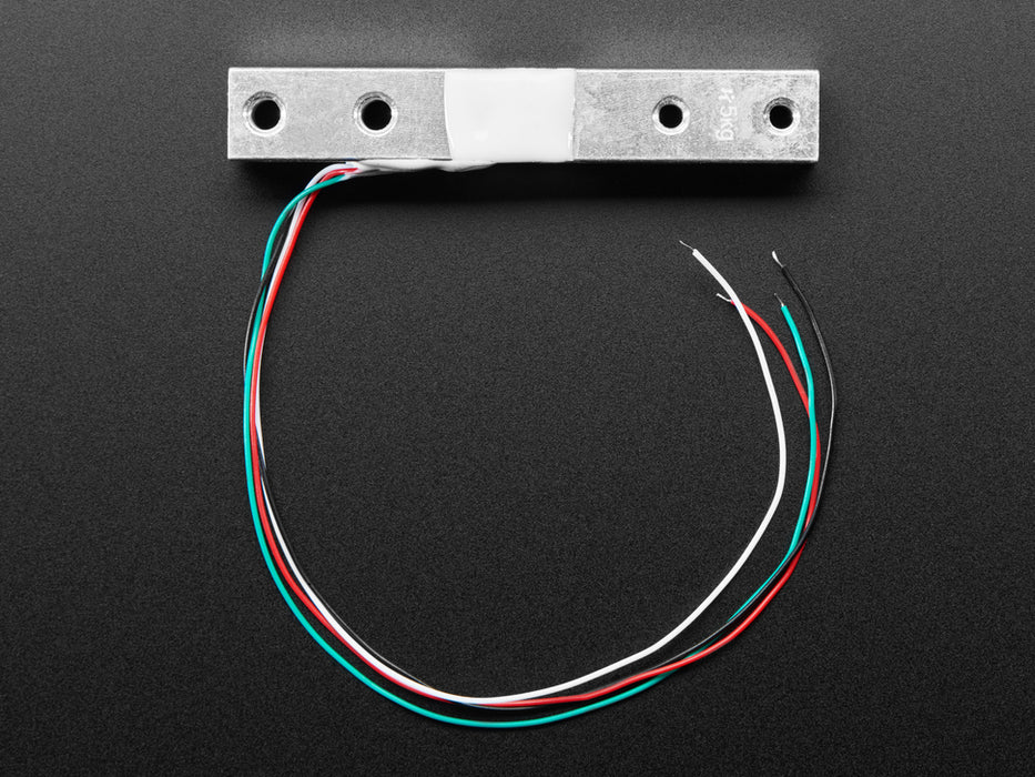 Angled shot of a Strain Gauge Load Cell - 4 Wires - 5Kg. 