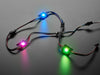 Three Ultra Bright 3 Watt Chainable NeoPixel LEDs glowing rainbow