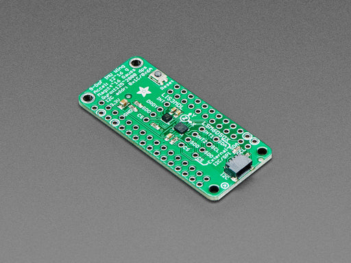 Angled shot of a Adafruit LSM6DSOX + LIS3MDL FeatherWing.