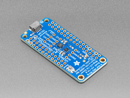 Top down view of a Adafruit ISM330DHCX + LIS3MDL FeatherWing.