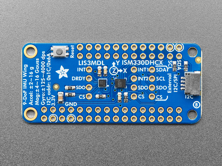 Top down view of a Adafruit ISM330DHCX + LIS3MDL FeatherWing.