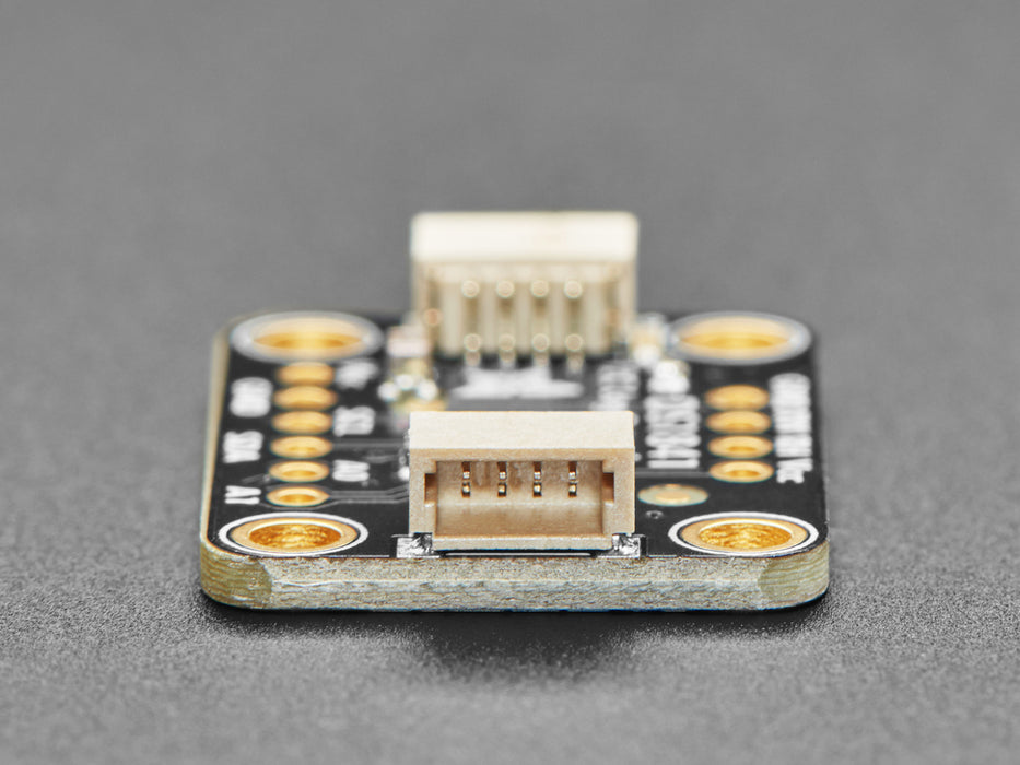 Angled shot of black, rectangular, digital potentiometer breakout board.