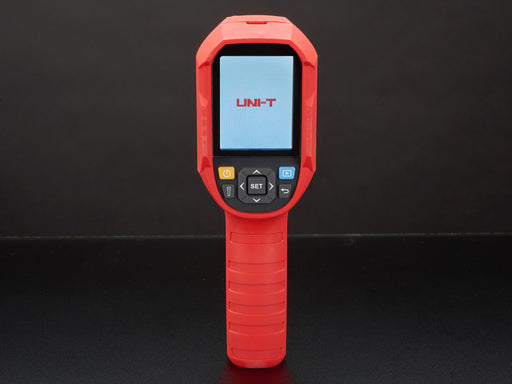 Thermal camera displaying a thermal image on it's lcd screen. Camera is red and grey, with the screen at the top of the camera and a handle at the bottom.