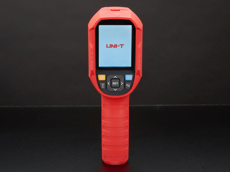 Thermal camera displaying a thermal image on it's lcd screen. Camera is red and grey, with the screen at the top of the camera and a handle at the bottom.