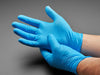 Blue nitrile gloves show being worn