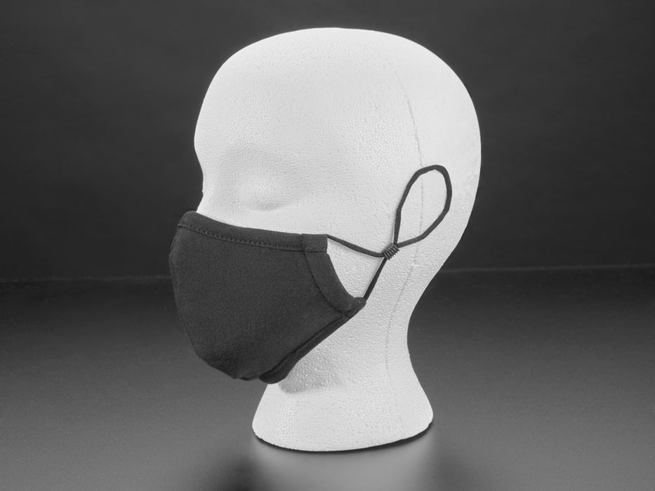 Black cloth face mask shown on a mannequin