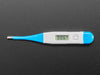 Blue and white thermometer showing a temperature reading