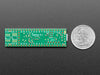 Angled shot of long green rectangular microcontroller.