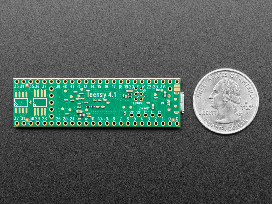 Angled shot of long green rectangular microcontroller.