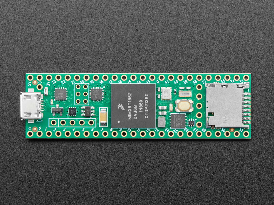 Angled shot of long green rectangular microcontroller.