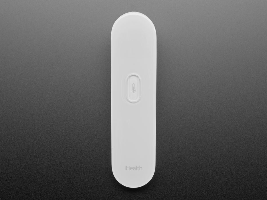 White no touch thermometer shown laying flat and displaying a temperature