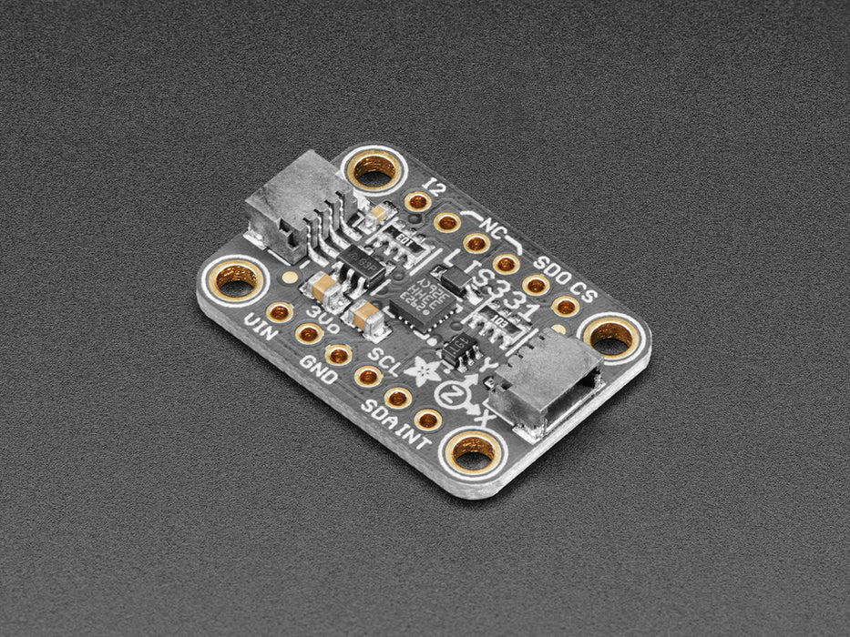 Angled shot of a Adafruit LIS331 Triple-Axis Wide-Range ��24g Accelerometer.