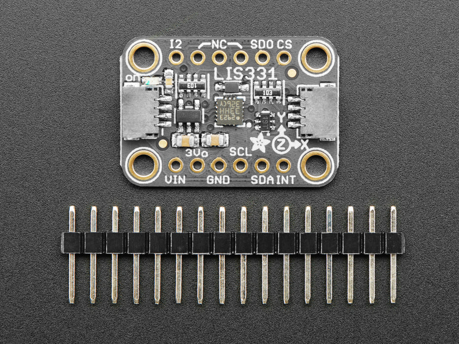 Angled shot of a Adafruit LIS331 Triple-Axis Wide-Range ��24g Accelerometer.