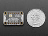 Angled shot of a Adafruit LIS331 Triple-Axis Wide-Range ��24g Accelerometer.