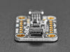 Angled shot of a Adafruit LIS331 Triple-Axis Wide-Range ��24g Accelerometer.