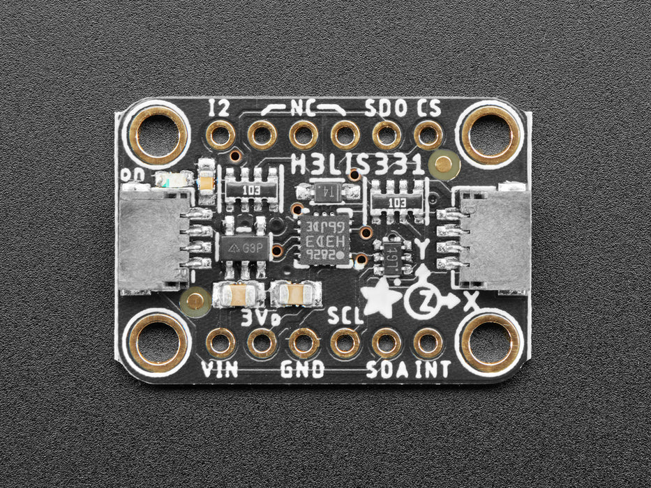 Angled shot of a Adafruit H3LIS331 Ultra High Range Triple-Axis Accelerometer.