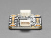 Angled shot of a Adafruit 9-DOF Absolute Orientation IMU Fusion Breakout.