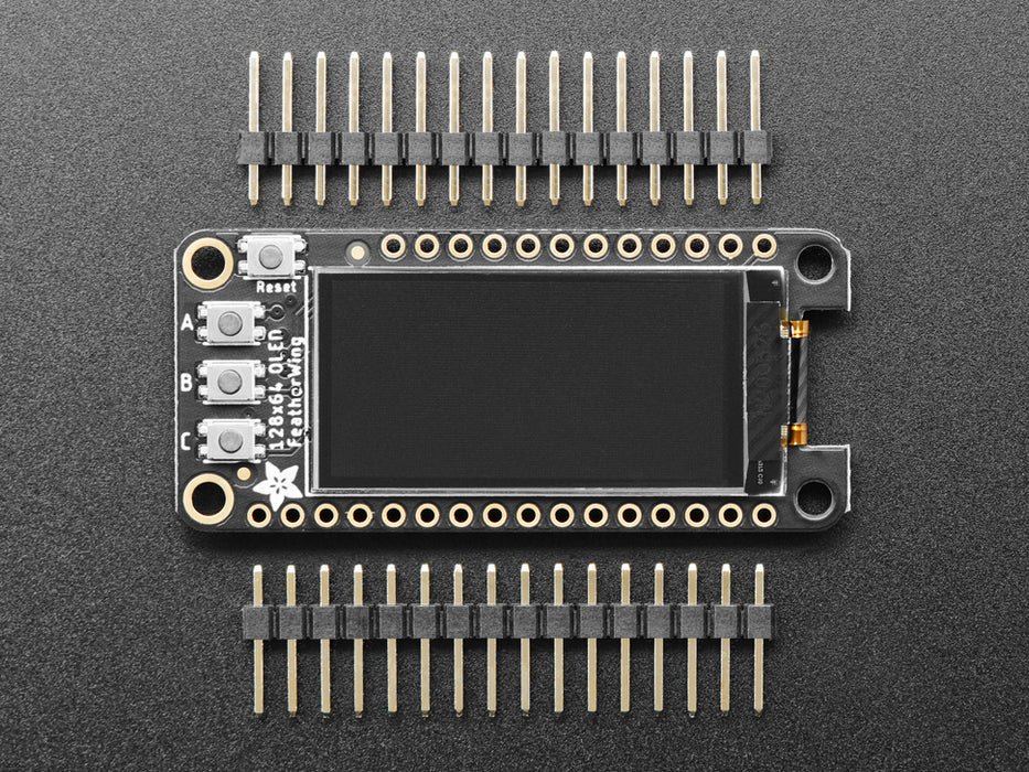 Video of a Adafruit FeatherWing OLED - 128x64 OLED Add-on For Feather - STEMMA QT / Qwiic connected to a temp and humidity sensor. Display reads "Adafruit" and various Temp and Humidity measures.  