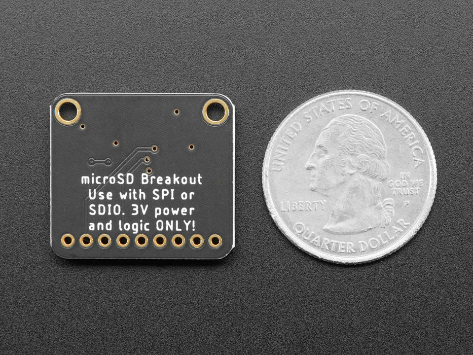 Angled shot of a Adafruit Micro SD SPI or SDIO Card Breakout Board. 