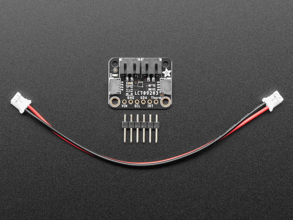 Top view of Adafruit LC709203F LiPoly / LiIon Fuel Gauge and Battery Monitor powered by a Lipoly battery and an OLED display.