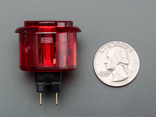 Angled shot of a translucent red round 30mm arcade button. 