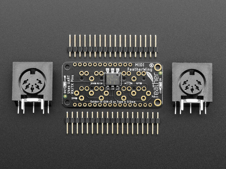 Angled shot of a Adafruit MIDI FeatherWing Kit. 