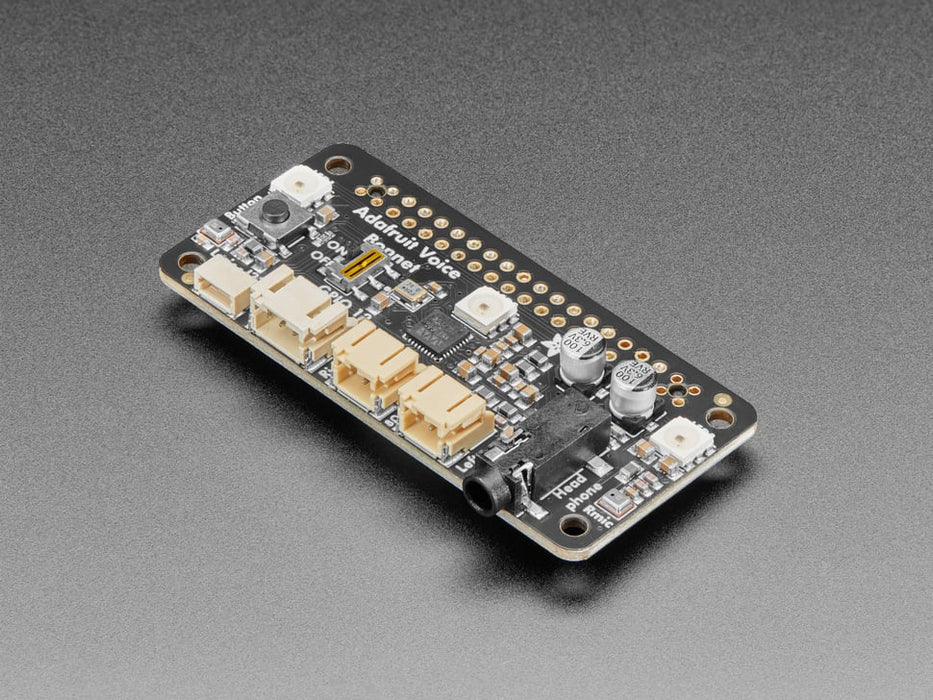 Top down view of a Adafruit Voice Bonnet for Raspberry Pi connected to a Pi/