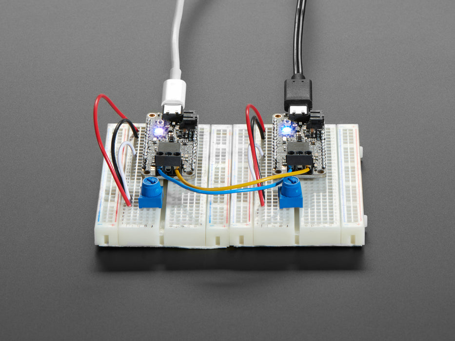 Angled shot of a Adafruit Feather M4 CAN Express with ATSAME51.