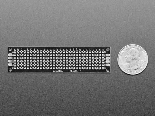 Angled shot of single Universal Proto-board PCB 2cm x 8cm