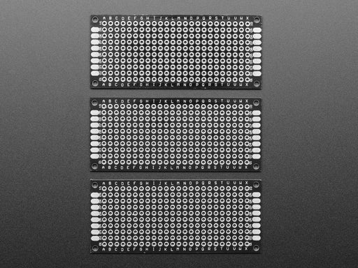 Angled shot of single Universal Proto-board PCB 3cm x 7cm.