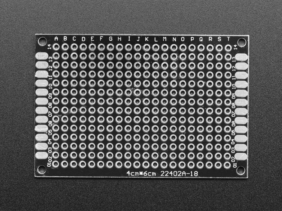 Angled shot of single Universal Proto-board PCB 4cm x 6cm