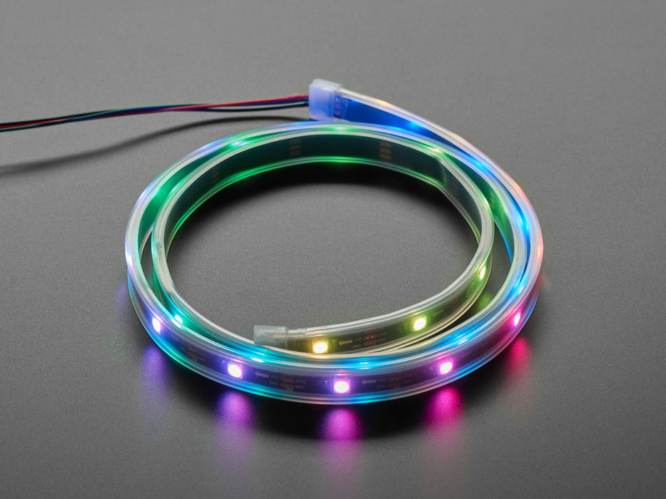 Adafruit NeoPixel LED Strip with 3-pin JST Connector lit up rainbow