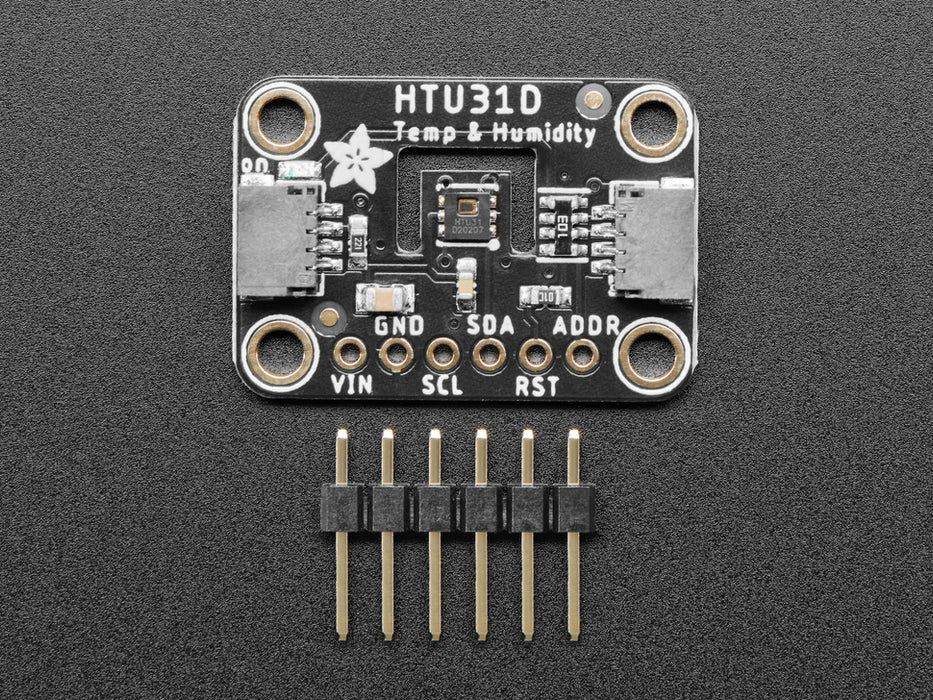 Top view of humidity breakout above an OLED display FeatherWing. The OLED display reads: "HTU31 Demo Temp: 24.19ºC Hum: 37.13%"