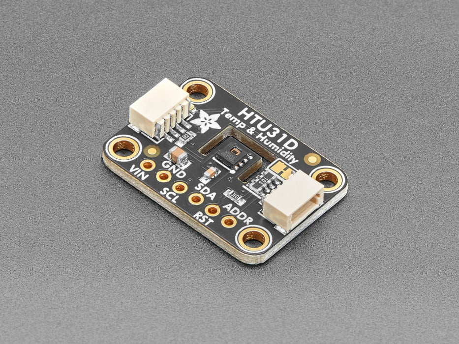 Top view of humidity breakout above an OLED display FeatherWing. The OLED display reads: "HTU31 Demo Temp: 24.19ºC Hum: 37.13%"