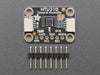 Top view of humidity breakout above an OLED display FeatherWing. The OLED display reads: "HTU31 Demo Temp: 24.19ºC Hum: 37.13%"