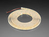 Long Coiled LED strip lit up warm white