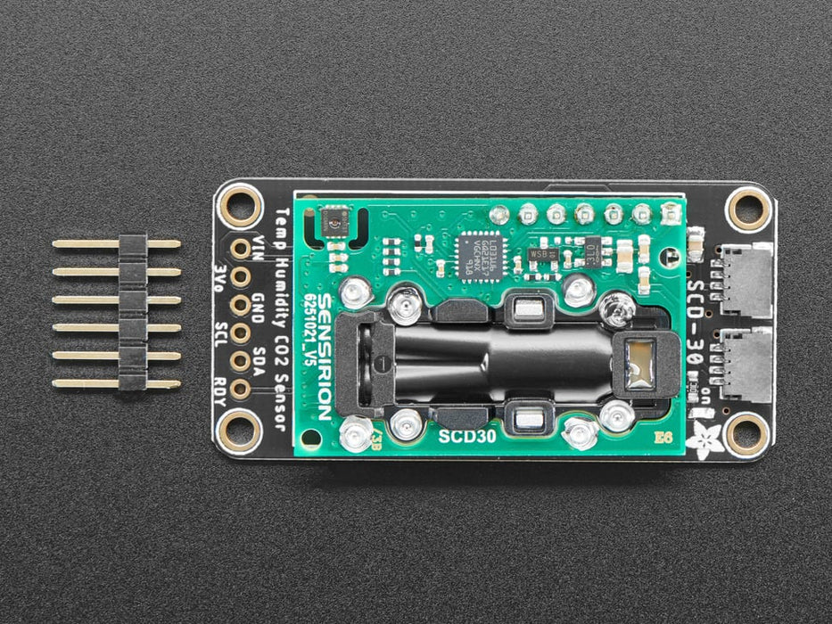 Video of someone blowing a dust on a Adafruit SCD-30 - NDIR CO2 Temperature and Humidity Sensor. 