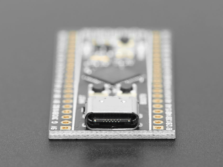 Angled shot of STM32F411 development board.