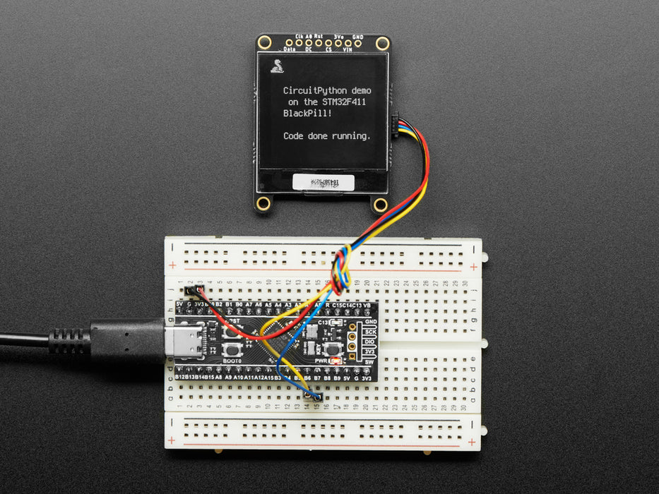 Angled shot of STM32F411 development board.