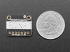 Angled shot of a Adafruit SPI Flash SD Card. 