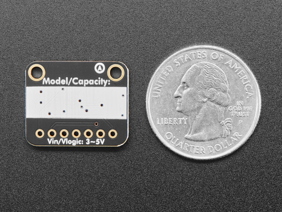 Angled shot of a Adafruit SPI Flash SD Card. 