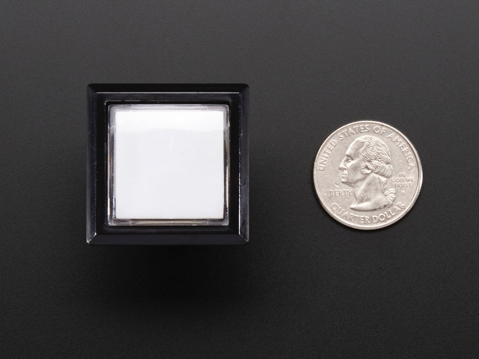 Angled shot of a rectangular white 30mm illuminated pushbutton. 