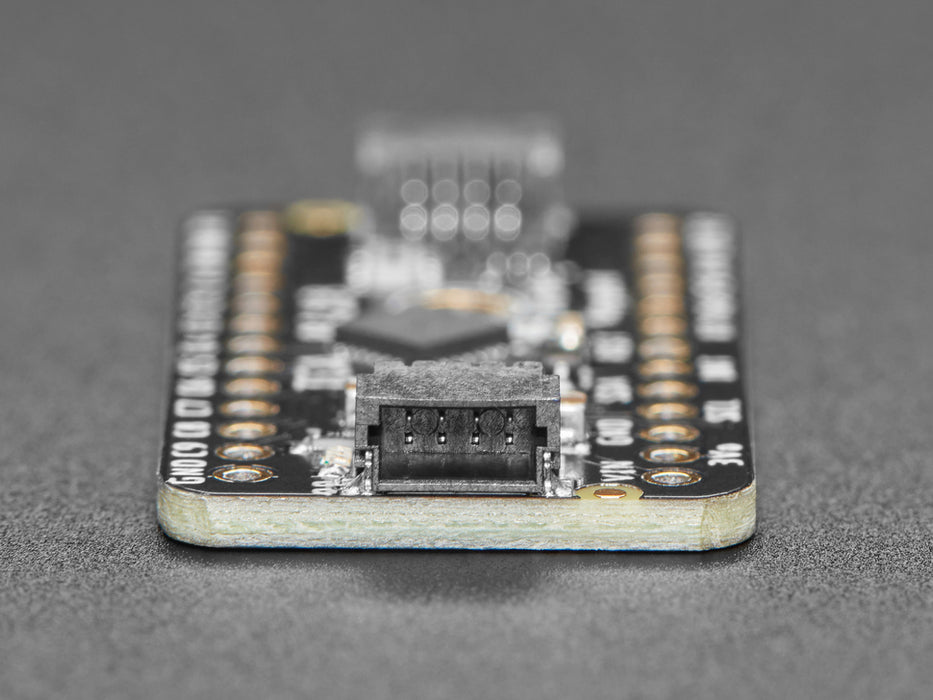 Video of an iridescent manicured hand tapping numbers on a flexible keypad matrix connected to a microcontroller on a full-size breadboard. The key inputs display on an OLED breakout.