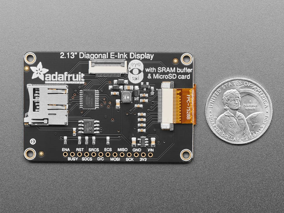 Video of a 2.13" tri-color eInk display assembled on a breadboard with jumper wires and a QT Py. Friendly snake in white-and-red, Blinka, appears on the display.