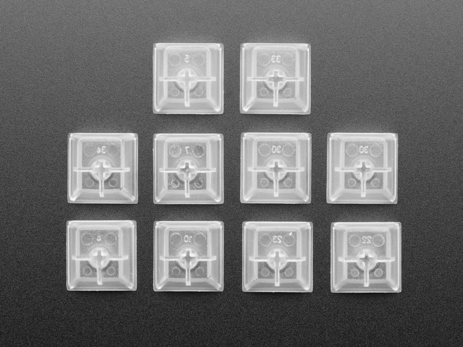 Angled shot of 10 translucent key caps.