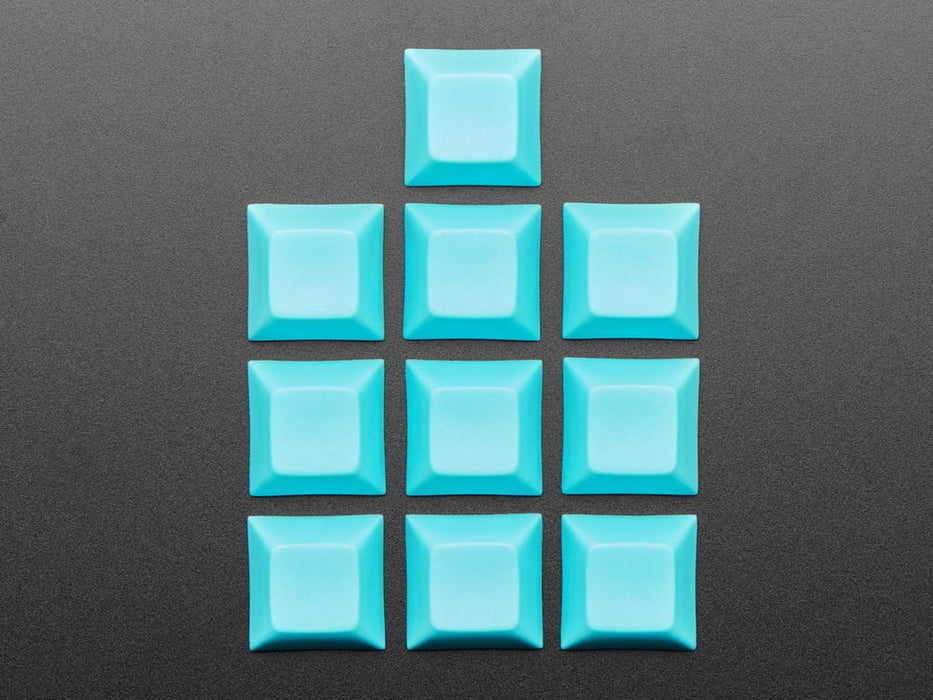 Angled shot of 10 Light Blue plastic keycaps.