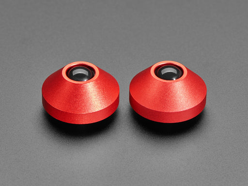 Angled shot of two red aluminum bumper feet.