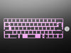 Angled shot of Anodized Purple Aluminum Metal Keyboard Plate.